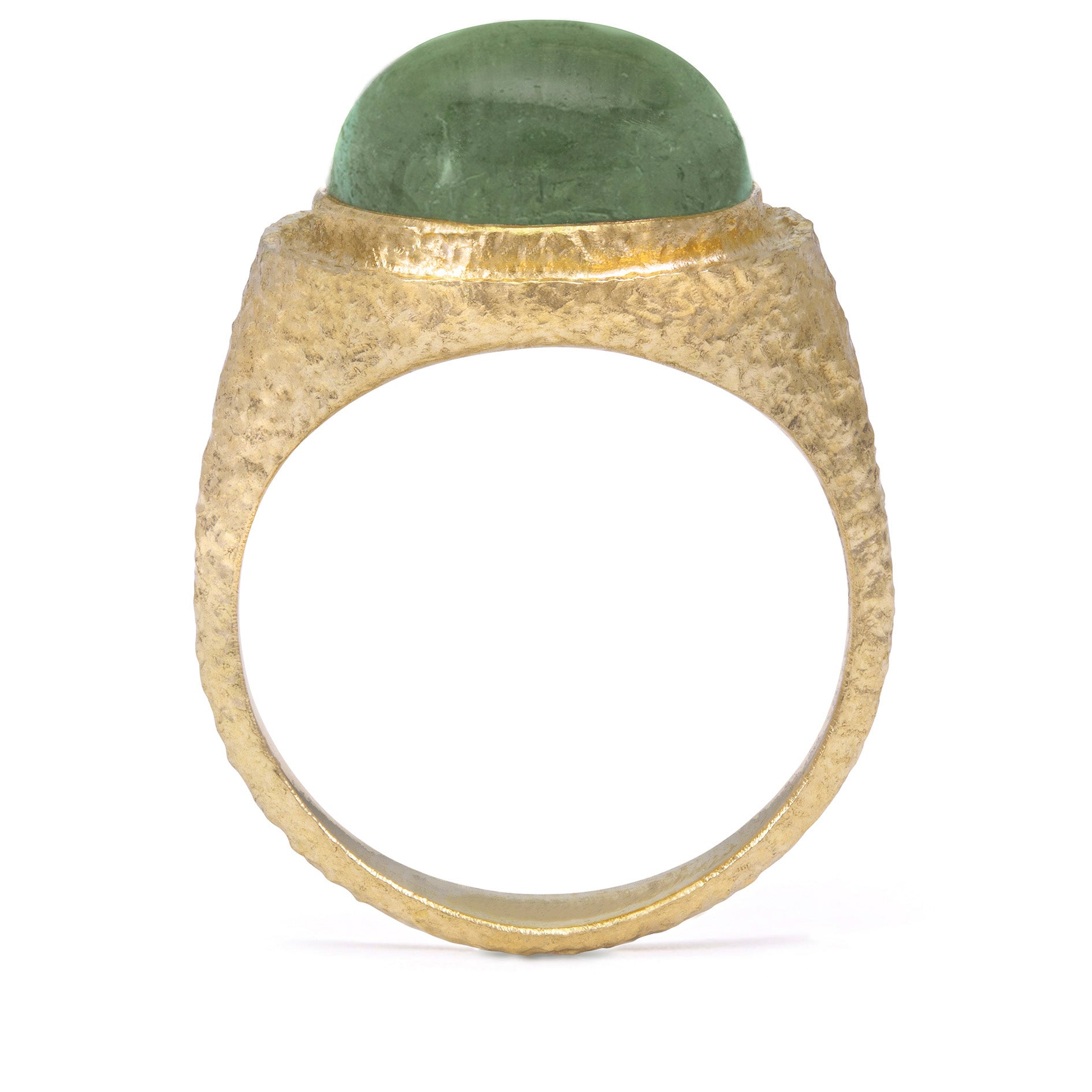 Gold ring with a green stone tourmaline on a white background