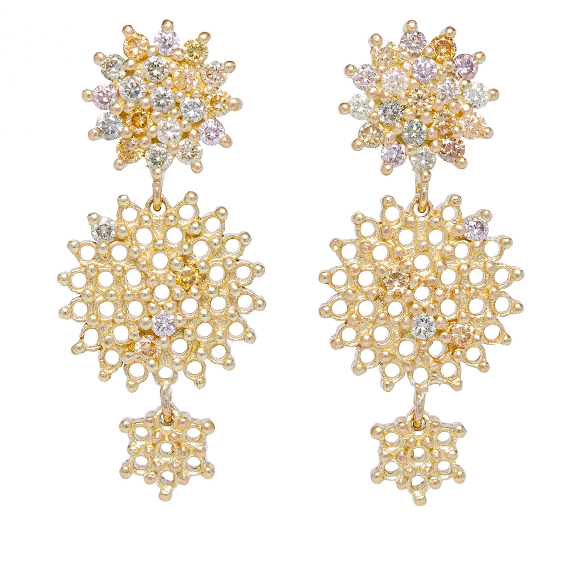 Gold and diamond earrings with intricate designs on a white background