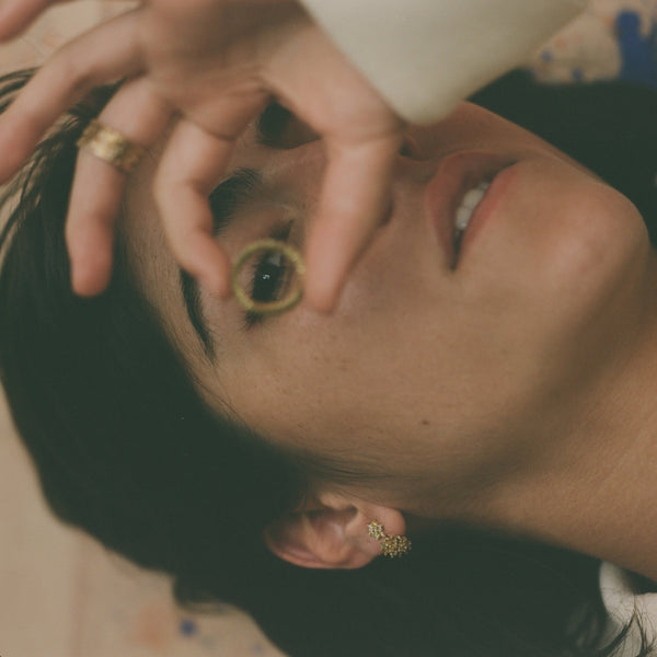 maya selway model wearing 18ct yellow gold diamond eternity rings edgy contemporary alternative fine jewellery